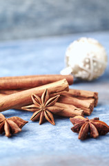 Obraz na płótnie Canvas Star anise with cinnamon. Christmas spices on rustic wooden background. Copy space. 
