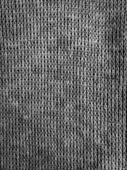 Grey, black and white knit fabric background texture