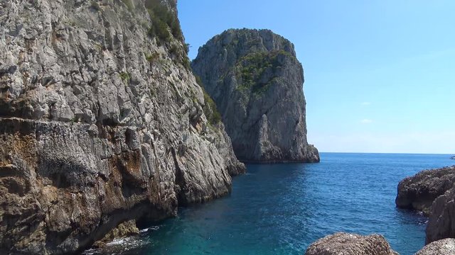 Italy, Capri, view of the Faraglioni bay, pan