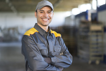 Portrait of a smiling industrial worker