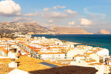 Sea view from the white houses with tiled roofs of the old town in Altea. Spain