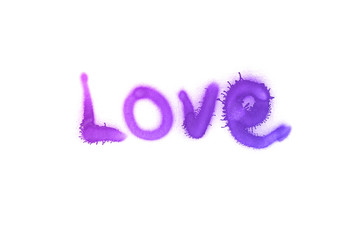 Graffiti love inscription sprayed on white isolated background