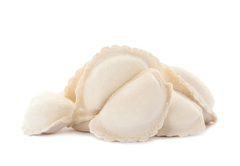 Heap of raw dumplings on white background