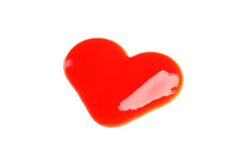 Heart shaped tomato sauce isolated on white