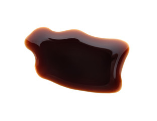 Delicious soy sauce isolated on white, top view