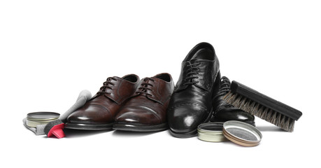 Stylish men's footwear and shoe care accessories on white background