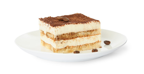 Plate of tiramisu cake isolated on white