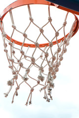 Fototapeta na wymiar Basketball ring ant net. in low angle view