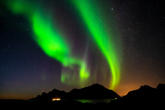 Aurora borealis over the mountains of Lofoten, Norway.