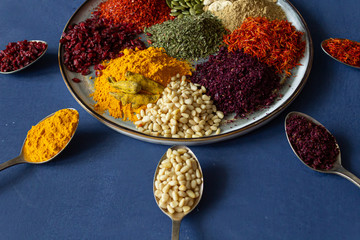 Colourful various herbs and spices for cooking on isolated background