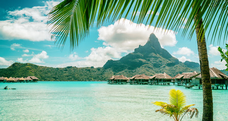 Bora Bora private island luxury vacation paradise beach background. Tahiti travel summer honeymoon destination.