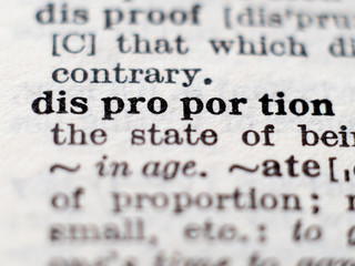 Obraz premium Dictionary definition of word disproportion. Selective focus.