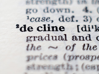 Dictionary definition of word decline. Selective focus.