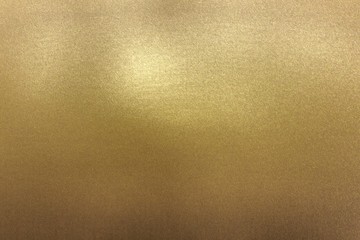 Scratches on gold metal wall, abstract texture background