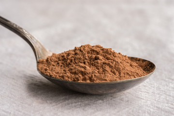 Carob powder on a Vintage Spoon