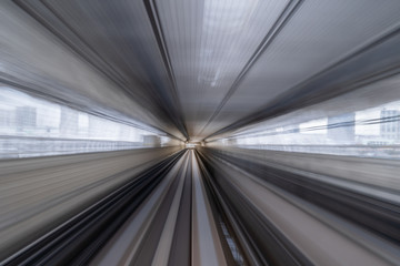 motion blur of train running on tunnel in Tokyo, Japan