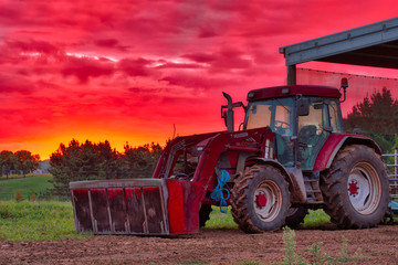 Tractor dueling Sunset