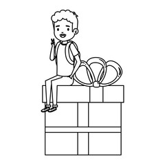 little school boy seated in giftbox