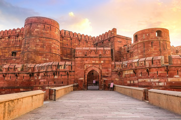 Agra Fort - Historic red sandstone fort of medieval India at sunrise. Agra Fort is a UNESCO World Heritage site in the city of Agra India. - obrazy, fototapety, plakaty