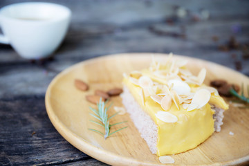 Cake and coffee cup on table.