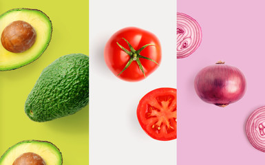 Creative layout made of tomato, onion and avocado on the white background. Flat lay. Food macro...