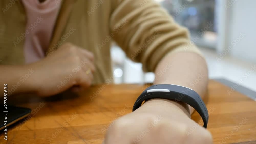 Aufkleber hands of woman using smart watch for cyber and futuristic concept select focus shallow depth of fiel