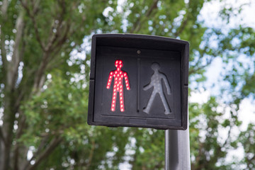 close-up of a red traffic light for pedestrians