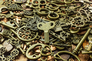 Old vintage keys gold texture on copper coin  abstract background.