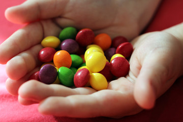 fruit jelly beans on hand so close