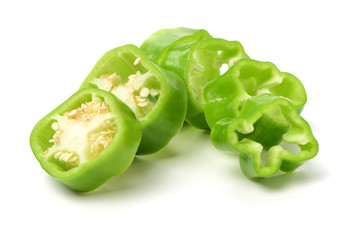 fresh green bell pepper slice (capsicum) on a white background