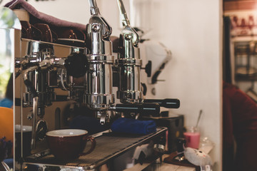 Coffee machine ready to make good a cup of espresso in cafe
