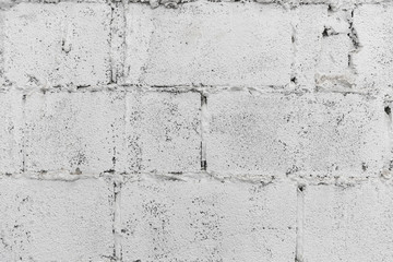 closeup of white decay brick wall abstract background wallpaper or web banner with copy space.