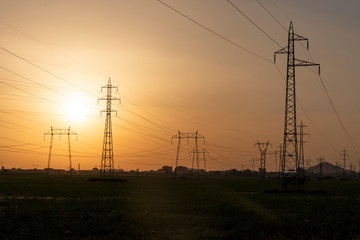 Sunset Landscape of High-voltage power lines in the land around city of Plovdiv, Bulgaria