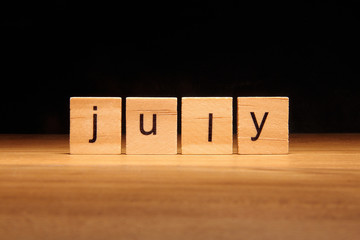 July wooden blocks.
