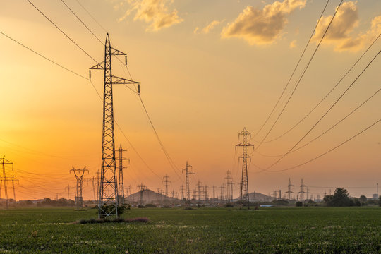 Sunset Landscape Of High-voltage Power Lines In The Land Around City Of Plovdiv, Bulgaria