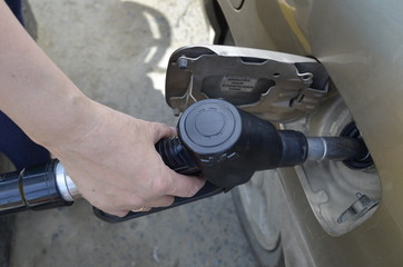 Obraz premium refueling machine with gasoline