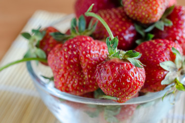 close up of fresh sweet strawberry's in glass