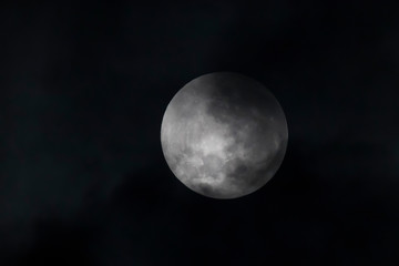 The moon in solar eclipse in the southern hemisphere
