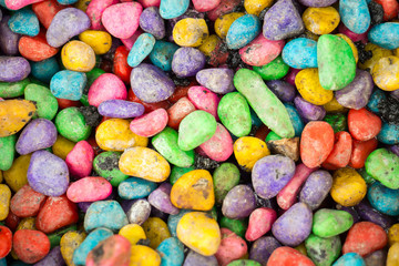 Colorful small stones background top view.Contrast style.Colorful pebbles close up.
