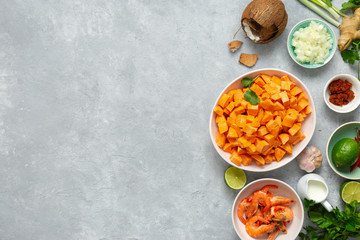 Raw ingredients cooking sweet potato soup shrimps top view