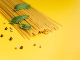 Basil leaves on bunch of spaghetti