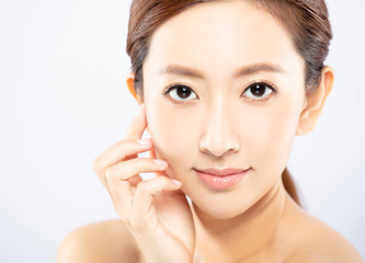 closeup young woman face with makeup and clean skin