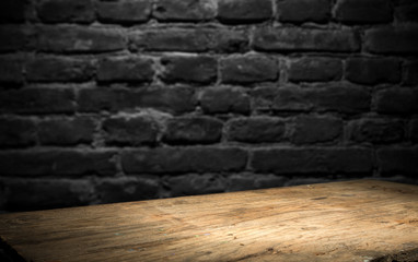 image of wooden table in front of abstract blurred background of resturant lights