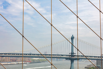 Obraz premium Manhattan Bridge over East river, New York city, view from Brooklyn bridge
