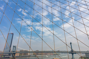 Fototapeta premium Manhattan Bridge over East river, New York city, view from Brooklyn bridge