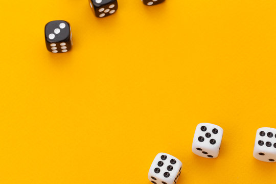 dice on a yellow background