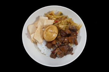 Indonesian food, egg, crackers isolated on black background