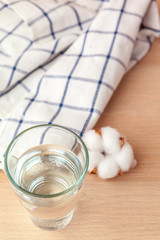 Glass of pure water on kitchen table