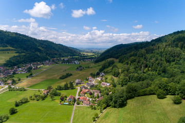 Fototapeta na wymiar Aerial photo of the small climatic health resort Muenstertal in the southern Black Forest