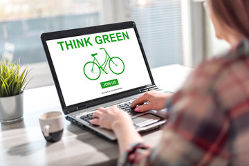Fototapeta na wymiar Think green concept on a laptop screen